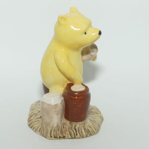 WP12 Royal Doulton Winnie the Pooh figure | Pooh Counting the Honeypots