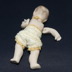 Bisque jointed and dressed baby boy doll | stringing needs tightening