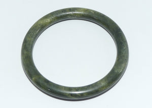 Mid 20th Century Chinese Nephrite Dark Green Jade bangle | round section