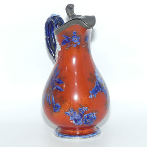 Victorian era Iron Red and Flow Blue decorated Pewter lidded jug