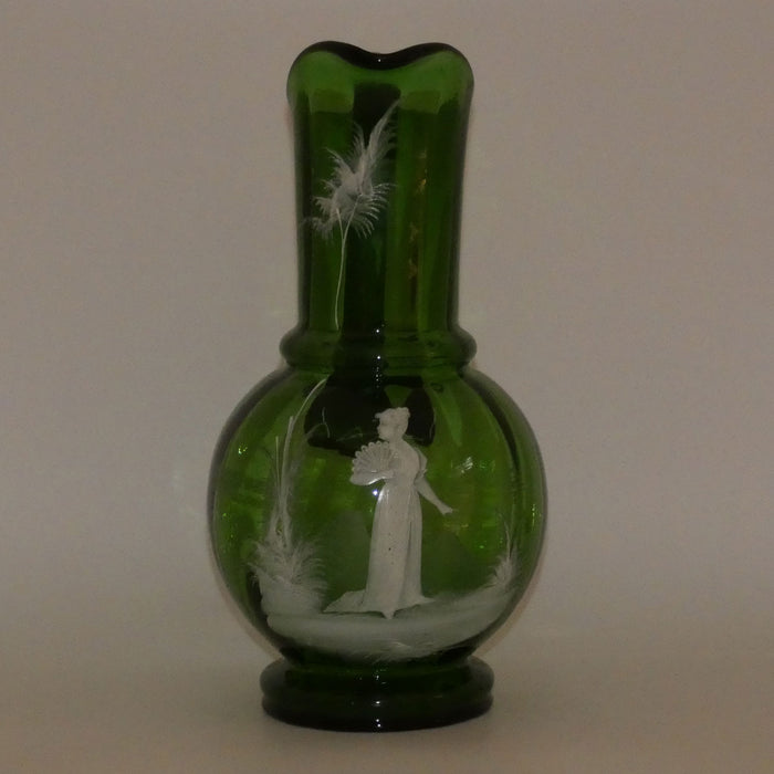 Green Mary Gregory tall bulbous jug depicting a young woman with fan