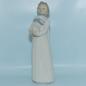 Nao by Lladro figure Boy in Nightshirt with Books #0233