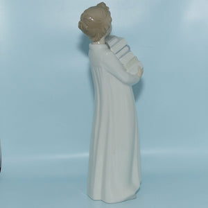 Nao by Lladro figure Boy in Nightshirt with Books #0233