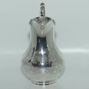 Victorian | Sterling Silver cream jug with scrolling decoration | London 1855