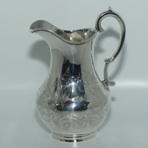 Victorian | Sterling Silver cream jug with scrolling decoration | London 1855