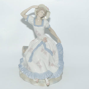 Zaphir | Nao | Lladro figure of a Seated Lady in Sun Hat