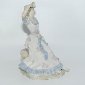 Zaphir | Nao | Lladro figure of a Seated Lady in Sun Hat