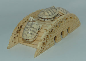 Carved Bone Turtles across Bridge figure