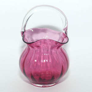 Small Cranberry Glass basket with clear glass handle