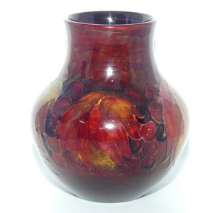William Moorcroft Flambe Leaves and Fruit bulbous base vase