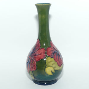 Walter Moorcroft Hibiscus | Olive Green ground slender neck vase | Paper Label intact