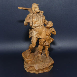 Wooden finely carved figure of Hunter and Son | Swiss | perhaps by Walter Stahli