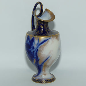 Doulton Burslem Blue Iris and Daffodil loop handle jug with gilt highlights