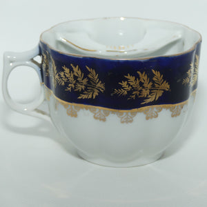 Victoria Austria Moustache cup and saucer duo | Blue and Floral