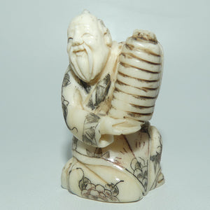 Japanese Carved Bone Netsuke | Old Man holding Lantern