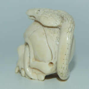 Japanese Carved Ivory Netsuke | Cobra intertwined through Skull