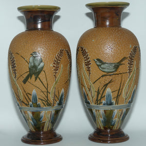 Doulton Lambeth Florence Barlow decorated pair of stoneware Vases featuring Birds amongst Ferns