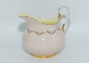Tuscan Fine English Bone China Pink and Gilt Swirl milk and sugar | Fancy handle | Yellow Interior