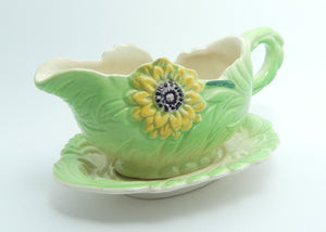 Shorter and Son Staffordshire Floral embossed mayonnaise jug and saucer