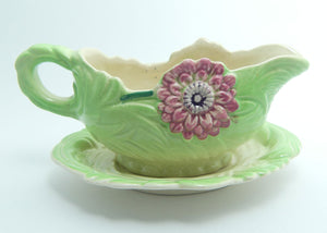 Shorter and Son Staffordshire Floral embossed mayonnaise jug and saucer