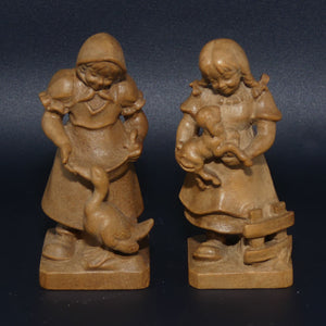 Pair of Wooden finely carved figures of Farm girls | Swiss | by Walter Stahli