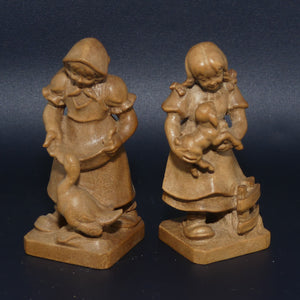 Pair of Wooden finely carved figures of Farm girls | Swiss | by Walter Stahli