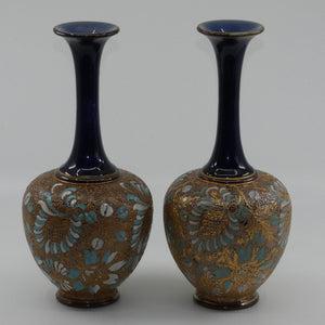 doulton-slaters-pair-of-stoneware-narrowneck-vases-with-blue-white-enamelling-gilt-highlights-stamped-5098-painted-x5094