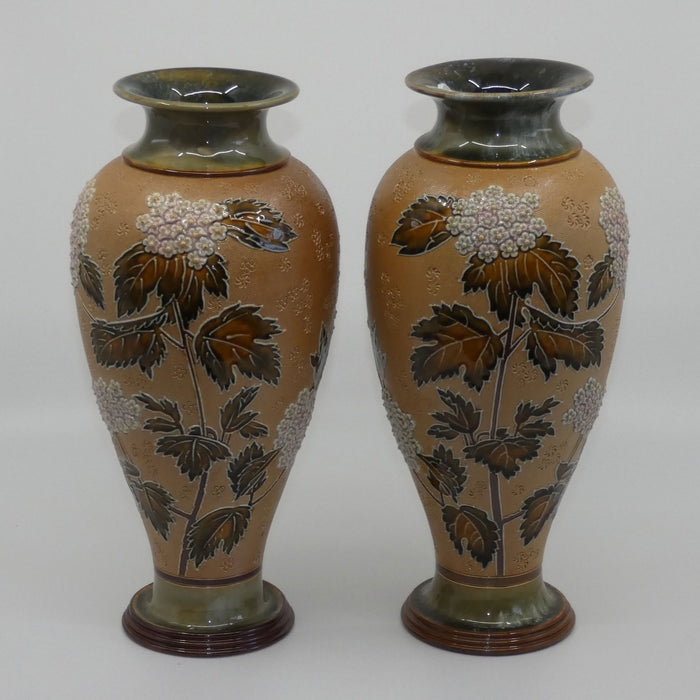 Doulton Slaters pair of stoneware foliage and flowers vases (stamped 6482)