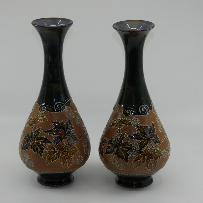 Royal Doulton pair of stoneware vases with applied foliage and scrolling (stamped 6767)