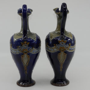 royal-doulton-pair-of-stoneware-ewers-with-applied-flowers-hearts-and-dots-stamped-7018
