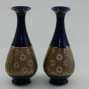 royal-doulton-pair-of-stoneware-vases-with-blue-green-white-enamelled-flowers-and-gilt-highlights-stamped-8334