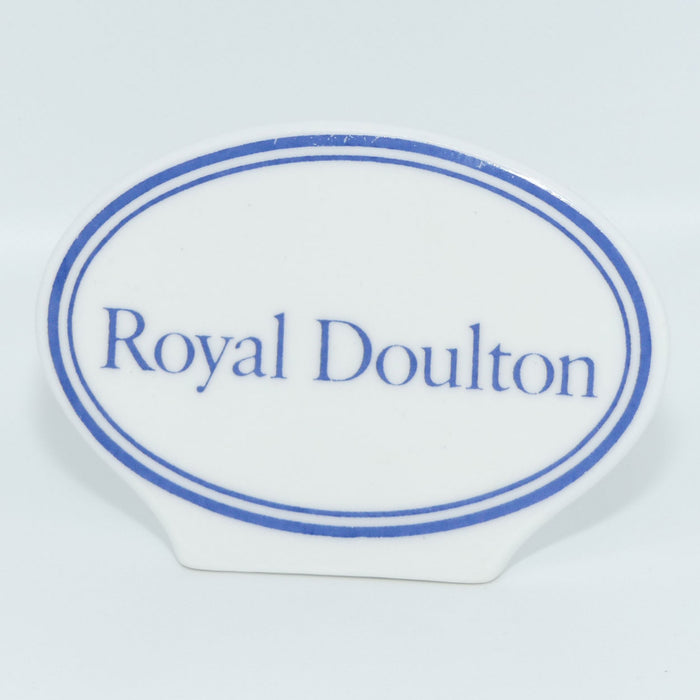 A Royal Doulton figurine oval display plaque