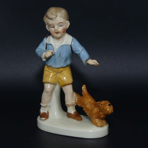 carl-scheidig-kunstporzellan-germany-schoolboy-with-dog-figurine