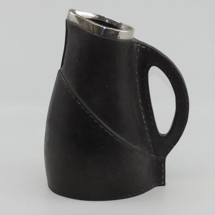 Doulton Lambeth England Leatherware jug with Sterling Silver rim