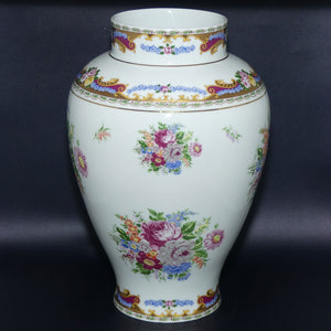 LG Porcelaine T Limoges tall floral decorated vase
