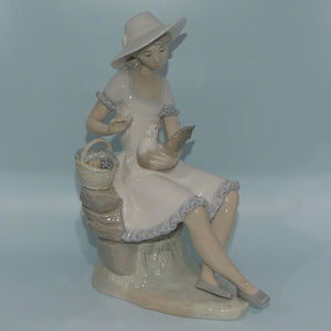 nao-by-lladro-figure-playing-with-rooster