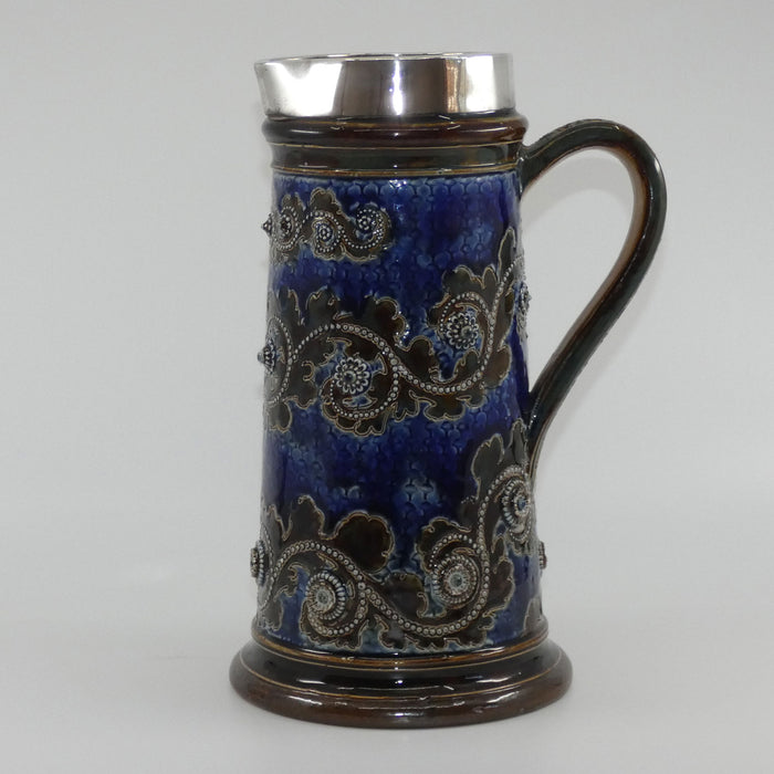 Doulton Lambeth George Tinworth stoneware ale jug with Sterling Silver rim (London 1876)