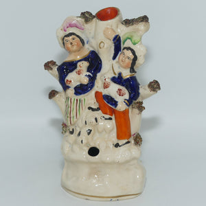 antique-staffordshire-figural-vase-couple-nursing-dogs-c-1860
