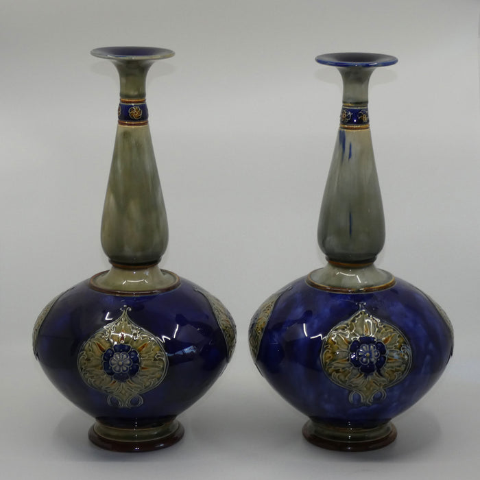 Royal Doulton stoneware pair of tall bulbous vases with applied floral rosettes