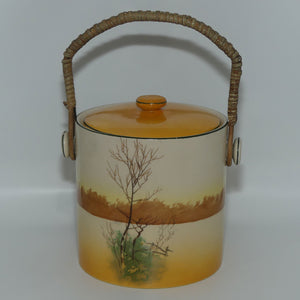 Royal Doulton Coaching Days biscuit barrel with wicker handle