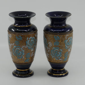 royal-doulton-pair-of-small-stoneware-vases-with-blue-white-enamelled-flowers-gilt-highlights-x5564