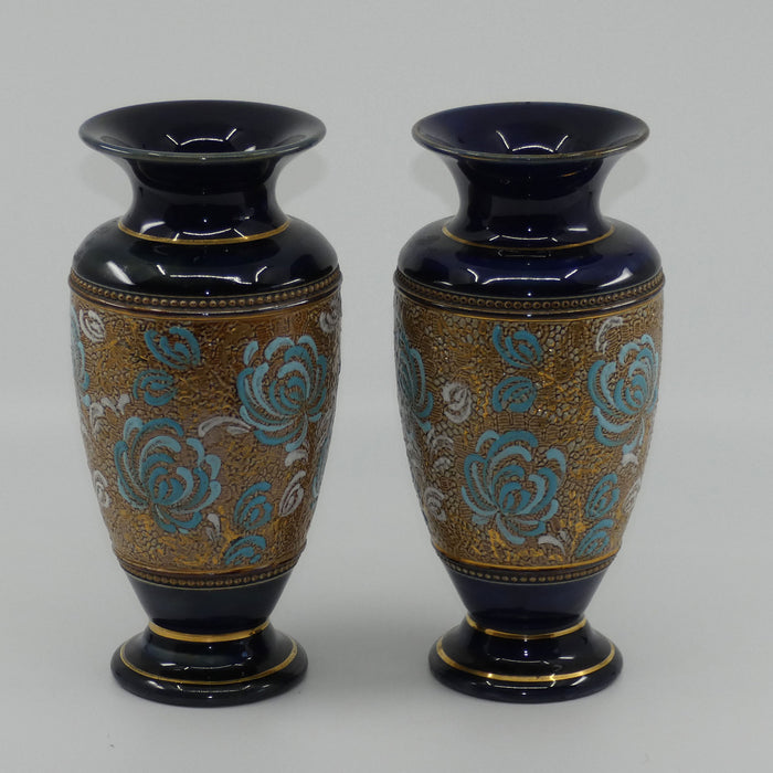Royal Doulton pair of small stoneware vases with blue & white enamelled flowers & gilt highlights (X5564)